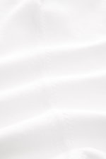 Close-up front view of the Filippo de Laurentiis Short sleeve jumper white, showcasing pure cotton fine knit fabric with a soft feel and standing collar. A versatile basic: This short sleeve jumper by FILIPPO DE LAURENTIIS features a timeless design and i