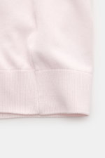 Close-up of the hem and side seam of the 04651/ A trip in a bag Kurzarmpullover 'Pima Cotton' rosé, showing its fine knit texture and ribbed cuff from a front-side perspective.

Description: <p>Aus feiner Pima-Baumwolle gefertigt, lässt Sie der Kurzarmpul