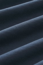 Close-up fabric texture of the 04651/ A trip in a bag Crew neck T-Shirt navy showing heavy quality pure cotton from a front angle. Durable basic: This crew neck T-shirt from 04651/ A TRIP IN A BAG is made from heavy cotton jersey, making it the perfect pi