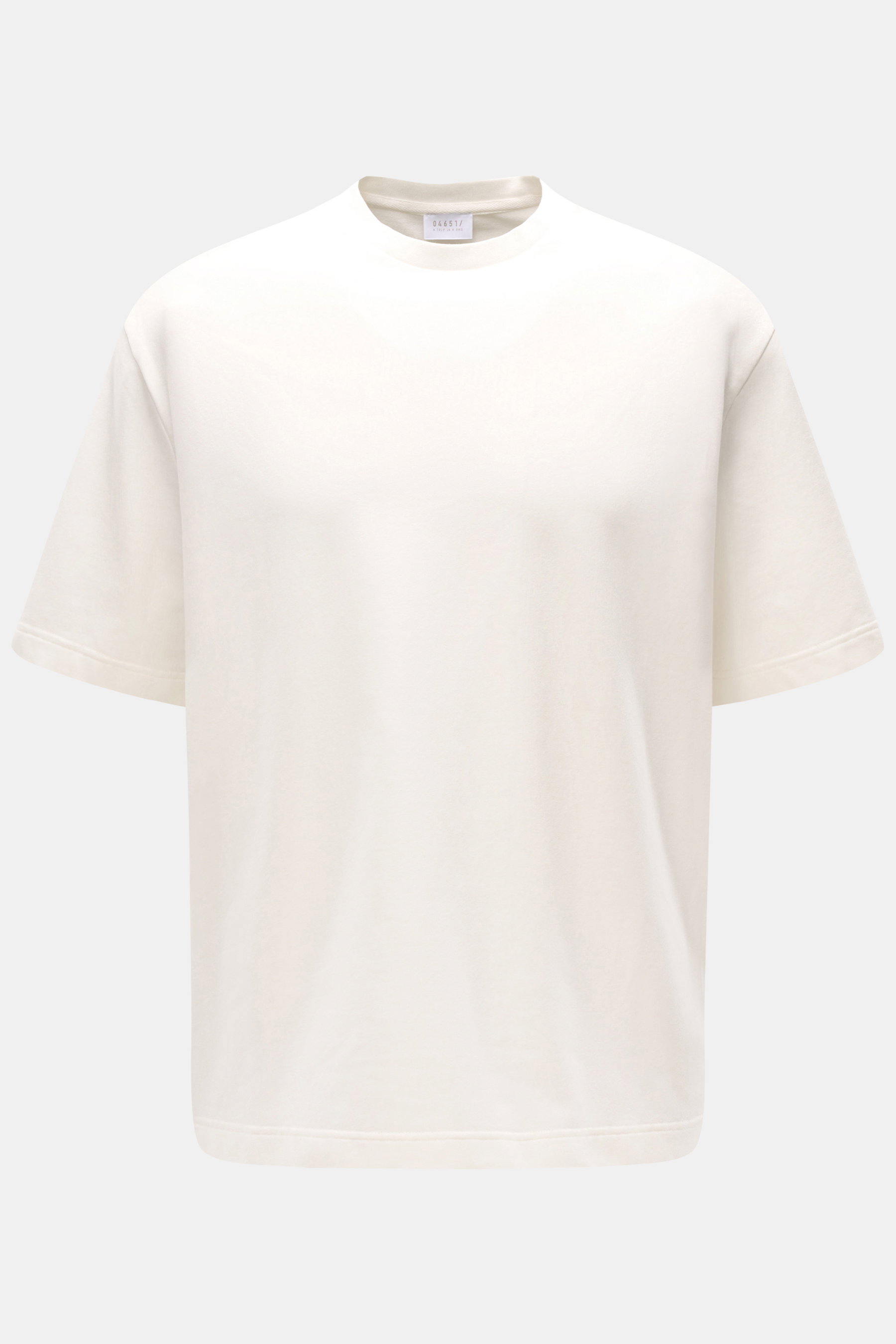 04651/ A trip in a bag Crew neck T-shirt 'If Tee' cream shown from front, made of elasticated cotton jersey with soft feel, heavy fabric, regular fit, crew neck, and side seam woven label. The uncomplicated cotton T-shirt 'IF Tee' by 04651/ A TRIP IN A BA