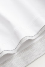 Close-up front view of Brunello Cucinelli Crew neck T-shirt white/light grey melange showing soft cotton fabric and contrasting double hems.

Description:
<p>BRUNELLO CUCINELLI delivers an essential basic for your casual wardrobe with this relaxed T-shirt