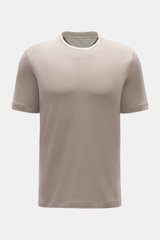 Front view of Brunello Cucinelli Crew neck T-shirt taupe/cream, slim fit with contrasting double hem on neckline, sleeves, and hem.

<p>BRUNELLO CUCINELLI delivers an essential basic for your casual wardrobe with this relaxed T-shirt in comfortable cotton