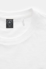 Close-up front view of Moose Knuckles Crew neck T-shirt 'Crescent Tee' white, jersey made of pure Pima cotton, soft feel, slim fit, crew neck, with signature patch metal logo on chest, rubberized label print on sleeve, small woven label in side seam.