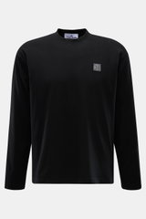 Front view of Stone Island Rundhals-Longsleeve schwarz in black, featuring a round neckline and chest logo patch.

<p>STONE ISLAND bietet mit diesem Rundhals-Longsleeve aus geschmeidigem Baumwolljersey mit Kompass-Logo auf der Brust ein komfortables Basic