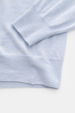 Close-up view of the sleeve and hem of the Filippo de Laurentiis Crew neck jumper pastel blue mottled, showcasing its fine knit texture and comfortable ribbed bands.

<p>Summery knitwear: With this jumper in a fine silk-cashmere blend, FILIPPO DE LAURENTI