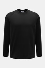 Frontansicht des schwarzen 04651/ A trip in a bag Longsleeve 'Nunu' aus schwerem Baumwoll-Jersey mit Rundhalsausschnitt und Raglanärmeln.