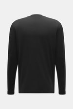 Back view of 04651/ A trip in a bag Longsleeve 'WJ Tee' black, a versatile basic with wool and microfiber blend, soft touch, regular fit, round neckline, and short hem slits, shown from the rear perspective.