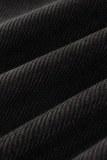 Close-up front view of dark brown corduroy fabric texture of the 04651/ A trip in a bag Popover corduroy shirt grandad collar, showcasing its soft feel and ribbed pattern. Timeless all-rounder: This popover corduroy shirt by 04651/ A TRIP IN A BAG is a ca