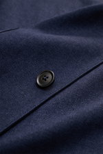 Close-up front view of the Zegna Overshirt navy showing its fine twill fabric, black button, and smooth linen and wool blend texture.

<p>This overshirt by ZEGNA, made from linen and wool, embodies Italian casual style with its pleasantly soft feel and de