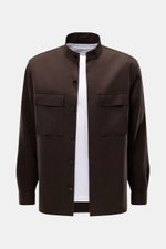 Zegna Linen overshirt dark brown shown from the front, featuring a grandad collar, concealed six-button placket, patch breast pockets with flap, cuffs with button, slanted hip pockets, short hem vents, and one inside pocket. 

<p>Minimalism from ZEGNA: Th