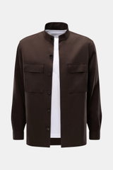 Zegna Linen overshirt dark brown shown from the front, featuring a grandad collar, concealed six-button placket, patch breast pockets with flap, cuffs with button, slanted hip pockets, short hem vents, and one inside pocket. 

<p>Minimalism from ZEGNA: Th