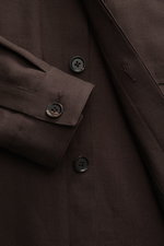 Close-up front view of Zegna Linen overshirt dark brown showing concealed six-button placket, grandad collar, and buttoned cuff. 

<p>Minimalism from ZEGNA: This casual overshirt in pure linen features a lightweight, clean design – perfect for elegant lay