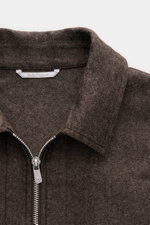 Close-up front top view of Marco Pescarolo Overshirt 'Urus' brown melange showing turn-down collar, two-way zipper, and fine woven texture, made of cashmere-cotton blend.  

Description: <p>MARCO PESCAROLO impresses with the traditionally Italian-made ove