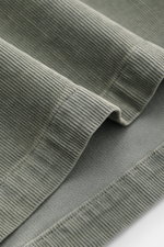 Alt tag (125 characters max):
Close-up front-side view of C.P. Company Cord Overshirt Grey Green showing soft, elastic corduroy texture and stitching details.

Detailed description incorporating provided content:
<p>Casualwear with character: The Cord Ove