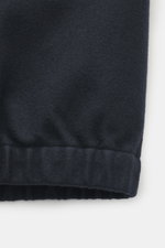 Close-up detail of the elastic cuff on the Stone Island Overshirt navy, photographed from the side, showing firm, felted quality made from a mix of virgin wool and high-quality microfiber, garment dyed, slim fit, high-closing two-way zipper, patch chest p