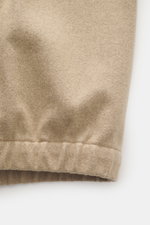 Stone Island Overshirt beige close-up from front showing fabric texture, elastic cuffs, mix of virgin wool and microfiber, firm felted quality.