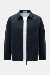 Front view of Stone Island Overshirt 'Canvas' navy, showcasing a robust utility look with organic cotton canvas, turn-down collar, two-way zipper, patch pocket with flap on sleeve, compass badge, adjustable snap cuffs, and unlined durable garment-dyed fab