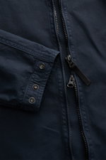Close-up front view of Stone Island Overshirt 'Canvas' navy showing durable canvas fabric, robust two-way zipper, and adjustable sleeve cuffs with snap buttons. Robust utility look with iconic character: This overshirt by STONE ISLAND impresses with canva