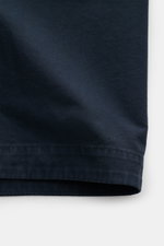 Close-up front view of Stone Island Overshirt 'Canvas' navy showing durable organic cotton canvas fabric with neat stitching and subtle texture. Robust utility look with iconic character: This overshirt by STONE ISLAND impresses with canvas made from pure