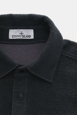 Close-up front view of Stone Island Overshirt navy collar and top button, showing textured bouclé wool and microfiber mix fabric.

Description:  
<p>Timeless layering essential: The bouclé overshirt from STONE ISLAND complements autumn and winter looks wi
