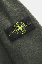Close-up front view of Stone Island Overshirt grey green showing the compass badge on the upper arm with textured boucle fabric.

Description: 
<p>Timeless layering essential: The boucle overshirt from STONE ISLAND complements autumn and winter looks with