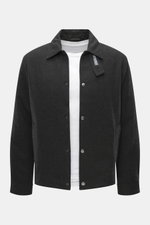 Front view of Woolrich Down jacket black melange in slim fit, made of wool and microfiber with light down filling, snap button placket, adjustable collar with button tab, slanted welt pockets, cuff sleeves with cuffs, adjustable waist width, quilted smoot