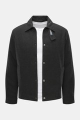 Front view of Woolrich Down jacket black melange in slim fit, made of wool and microfiber with light down filling, snap button placket, adjustable collar with button tab, slanted welt pockets, cuff sleeves with cuffs, adjustable waist width, quilted smoot