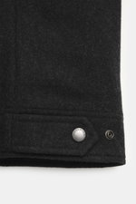 Woolrich Down jacket black melange shown from front close-up, featuring wool and microfiber, light down filling, slim fit, snap button placket, adjustable collar with button tab, slanted welt pockets, cuff sleeves with cuffs, adjustable waist width, quilt