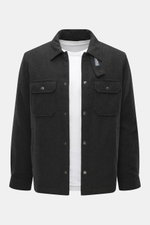 Front view of Woolrich Down jacket 'Alaskan' black melange in wool and microfiber, light down filling, slim fit, snap button placket, adjustable collar with button tab, patch chest pockets, slanted welt pockets, sleeve cuffs with cuff, and quilted smooth 
