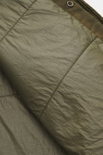 C.P. Company Corduroy Overshirt khaki shown from a close-up angle highlighting soft cotton texture, snap button, and stitching details.