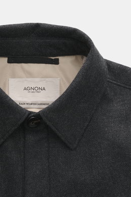 Agnona Cashmere overshirt dark grey melange shown from top front angle, pure cashmere, soft touch, regular fit, six-button placket, turn-down collar, breast pockets with flap, buttoned sleeve cuffs.