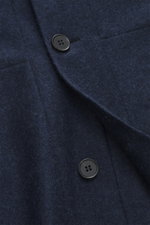Harris Wharf London Cashmere overshirt navy melange close-up from above showing pure cashmere, knitted and felted quality, very soft touch, raw-edge finish, slim fit, five-button placket, turn-down collar, patch chest pockets with flap, angled welt pocket