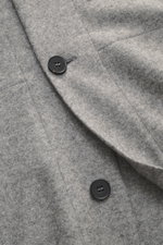 Close-up front view of Harris Wharf London Cashmere overshirt grey melange showing pure cashmere fabric, knitted and felted quality, very soft touch, raw-edge finish, slim fit, five-button placket, turn-down collar, patch chest pockets with flap, angled w