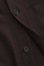 Harris Wharf London Cashmere overshirt dark brown close-up from front showing pure cashmere, knitted and felted quality, very soft touch, raw-edge finish, slim fit, five-button placket, turn-down collar, patch chest pockets with flap, angled welt pockets,