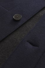 Close-up front view of Harris Wharf London Overshirt navy showing a single button, turn-down collar, angled hip pocket, made of virgin wool and cashmere, light soft quality, slim fit, five-button style, sport cuffs, unlined.