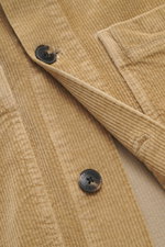 Close-up front view of the Closed Cord overshirt 'Atelier' light brown showing cotton corduroy fabric, black buttons, and stitching details.

Description:  
<p>Casual through the new season: For relaxed combinations, CLOSED presents the modern overshirt '