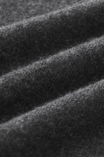 Close-up front view of the fine knit pattern and soft texture of the Aida Barni Cashmere V-neck jumper dark grey melange.

<p>Luxury-class essential: The Italian label AIDA BARNI processes premium cashmere in this timeless V-neck sweater with a regular fi