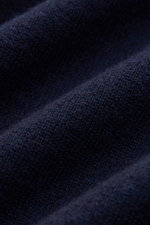 Alt tag (124 characters): Close-up front view of Brunello Cucinelli Cashmere V-neck jumper navy showing fine knit and soft texture, narrow borders.