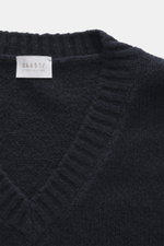 Close-up top-down view of the navy 04651/ A trip in a bag V-Neck Pullover 'Light Wool' featuring a mix of wool and microfiber, fine knit pattern, soft touch, regular fit, textured knit at hem and sleeves, and wide ribbed cuffs.
