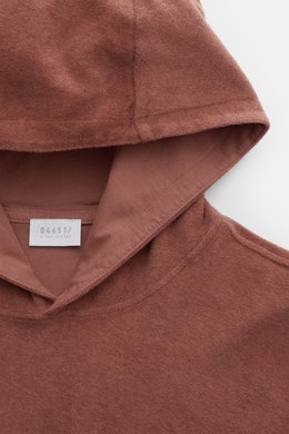 Close-up front-top view of 04651/ A trip in a bag Terry hooded jumper 'Terry' rust brown made of pure cotton terrycloth.

Description: <p>Comfort and coolness with summery nonchalance: The hooded jumper 'Terry' by 04651/ A TRIP IN A BAG made of pure cotto