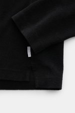 Schwarzer 04651/ A trip in a bag Frottee-Kapuzenpullover 'Terry' aus Baumwoll-Frottee, weicher Griff, Regular Fit, Kapuze, Seitennaht-Label, Detailaufnahme von unten.