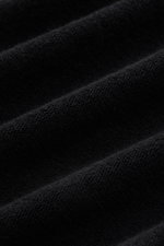 Schwarze Nahaufnahme des Baumwoll-Frottee-Stoffs vom 04651/ A trip in a bag Frottee-Kapuzenpullover 'Terry' mit weichem Griff.