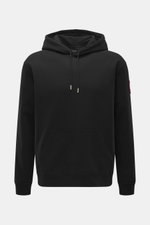 Front view of Canada Goose Hoodie 'Loon' black with hood, drawstring, kangaroo pocket, ribbed cuffs, and logo on upper arm.

Description: <p>Urban style meets comfort – the 'Loon' hoodie by CANADA GOOSE combines pleasant wearing comfort with a sporty-eleg