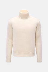 Lunaria Cashmere Cashmere Rollkragenpullover creme in Frontansicht, Slim Fit, mittelfeines Strickbild, weicher Griff, Rippkragen und Rippbündchen.