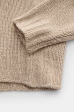 Fedeli Rollkragenpullover 'Derby' beige meliert, Detailfoto von Ärmel und Saum, grobes Strickbild, Rippbündchen, Mix aus Cashmere und Seide, Regular Fit, weicher Griff.
