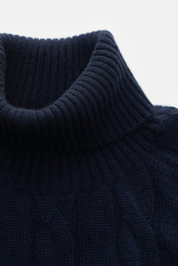 Close-up front view of von Braun Cashmere turtleneck jumper navy, featuring a soft, pure cashmere fabric with a timeless cable knit pattern and flexible ribbed bands for a regular fit and close-fitting turtleneck. Comfortable through the winter: Soft cash