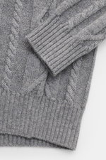 Close-up top-down view of the von Braun Cashmere turtleneck jumper grey mottled showing cable knit patterns, ribbed cuffs, and hem. Elegant everyday piece: Premium cashmere from Inner Mongolia forms the basis for this luxurious VON BRAUN turtleneck jumper