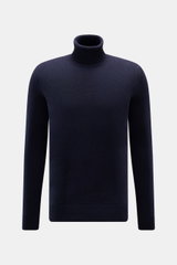 Von vorne fotografierter von Braun Cashmere Rollkragenpullover navy aus reiner, weicher Mongolei-Cashmere mit Regular Fit, mittelfeinem Strickbild, anliegendem Rollkragen und Rippbündchen.