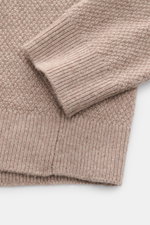 Alt tag (123 characters): Close-up from above of the von Braun Cashmere turtleneck jumper beige mottled showing fine knit and ribbed cuff details.

Description:  
<p>Get ready for the colder months with VON BRAUN: This turtleneck jumper in pure, Mongolian