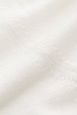 von Braun Merino Rollkragenpullover creme aus feiner Merinowolle, Slim Fit mit anliegendem Rollkragen und flexiblen Rippbündchen, Detailfoto des Strickbilds aus Nahaufnahme
